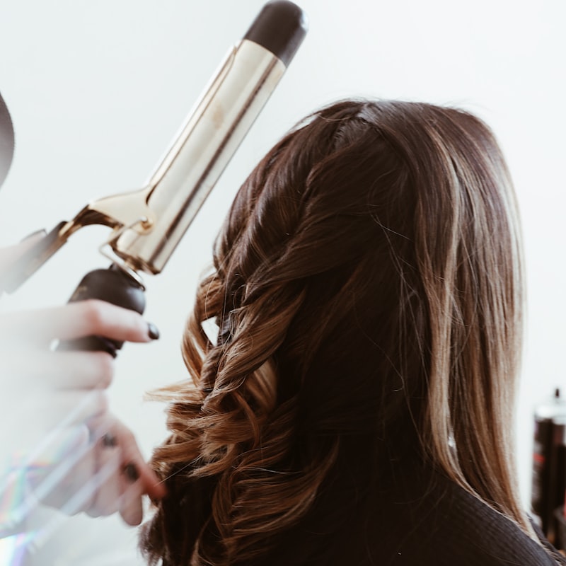 Model showing precision cut brunette hair
